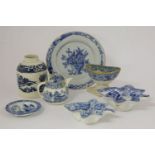 A small late 18th century navette shaped blue and white transfer painted salt, a cylindrical tea
