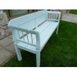 An early 20th century blue painted pine bench, the panel back above solid seat, on square section