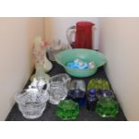 An assortment of glassware, including a cranberry jug, an art glass bowl, a scent bottle, etc