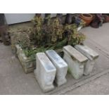 A pair of reconstituted stone rectangular trough planters, classical moulded decoration, supports to