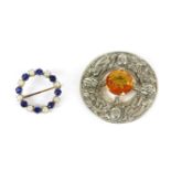 A Scottish silver brooch, set with a yellow paste stone, and a 9ct gold split pearl and synthetic