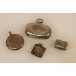 A George III silver vinaigrette in the form of a small bag, decorated all over with chased and