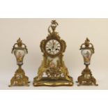 A 19th century French gilt bronze mantel clock with porcelain dial and panel, on stand, 40cm high