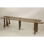 A pair of oak benches, 197cm in length