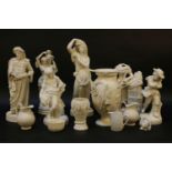 Four Parian figures, two restored, one damaged, and other Parian ware jugs