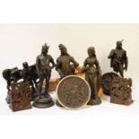 A collection of early 20th century Spelter figures, together with a pair of bronzed wall plaques,
