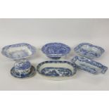 An early 19th century blue and white transfer printed hot water plate, 'The Winemakers' pattern,