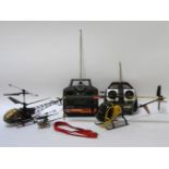 Two remote control helicopters, 'Fly Dragonfly' and 'Lama', with controls