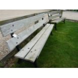 A pair of garden benches, with iron ends and hardwood slates, 182cm wide