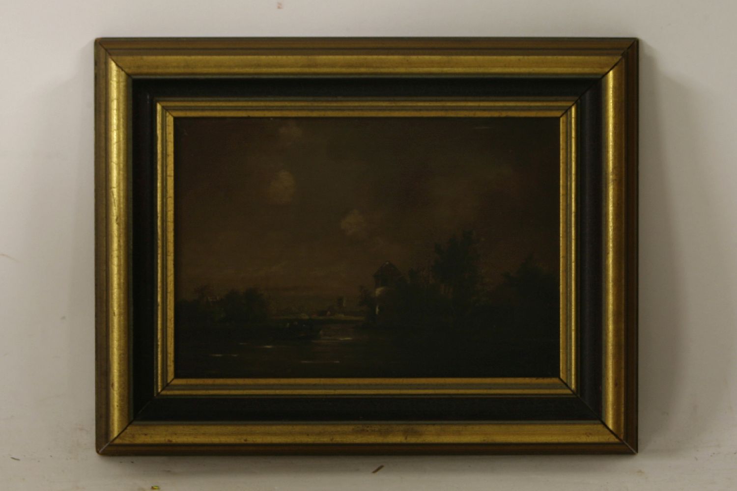 Dutch SchoolA RIVER LANDSCAPE WITH FIGURES ON A BOATIndistinctly signed lower right, oil on