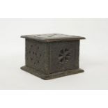 An antique Dutch chip carved carriage foot warmer, 15.5cm high, poor condition