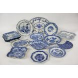 An early 19th century blue and white pearlware plate, painted with an oriental figure pointing,