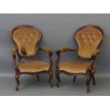 A matched Pair of mahogany framed easy chairs