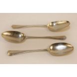 Three early 18th century silver table spoons, all three indistinct London hallmarks, approximately 4