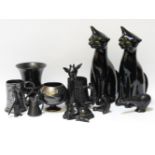 A pair of mid 20th century black glazed pottery cats, and a collection of pewter lustre wares (11)