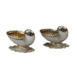 Two Regency style white metal salts, in the form of nautilus shells, 4.5cm high (2)