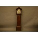 An 18th century eight day oak longcase clock, by William Peacock, Kimbelton, the brass arching