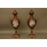 A pair of large sevres style porcelain vases, puce ground and with printed roundalls of classical