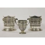 A silver twin handled cup, inscribed and dated 1927, and a pair of plated bottle coasters, 13.5cm