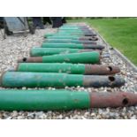 A set of 20 iron 'cannon shell' bollards drilled to take a rope or chain each 84 cm tall