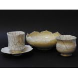 A Studio pottery 'Leman Lotus' bowl, 22cm diameter, two similar goblets and a similar dish, all