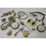 A collection of costume jewellery to include a silver knot brooch, a 1964 Scottish silver brooch set