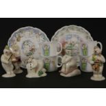A quantity of Royal Doulton 'Snowman' porcelain figures, cups and saucers, etc