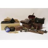 A collection of Vintage cameras, opera glasses and other similar