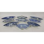 A quantity of late 18th century/early 19th century blue and white transfer printed segment dishes,