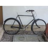 An early 20th century black painted bicycle