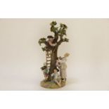 A late 19th century Meissen figure group of fruit pickers, 27cm high (a/f)