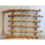 A large antique wooden harrow, with 42 wooden tines, 130 x 195cm