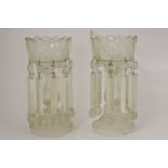 A pair of Victorian cut glass table lustres, with prismatic cut drops, one missing, 32cm high (2)