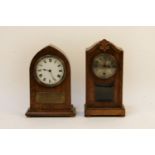 An oak and chequer strung lancet clock, with inscribed plaque and another clock