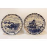 A pair of modern Dutch Delft blue and white chargers, 40cm diameter