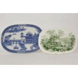 A Victorian blue and white drainer, buildings and river bridge, 58.5cm, and a green and white