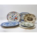 Five Victorian blue and white meat plates, a drainer, and three further plates