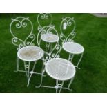 Six wrought iron garden chairs, with pierced seats