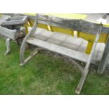 A Liberty style Arts & Crafts garden seat, 105cm wide