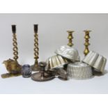 A quantity of metal wares including brass candlesticks, flatware, etc