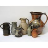 Seven studio pottery jugs