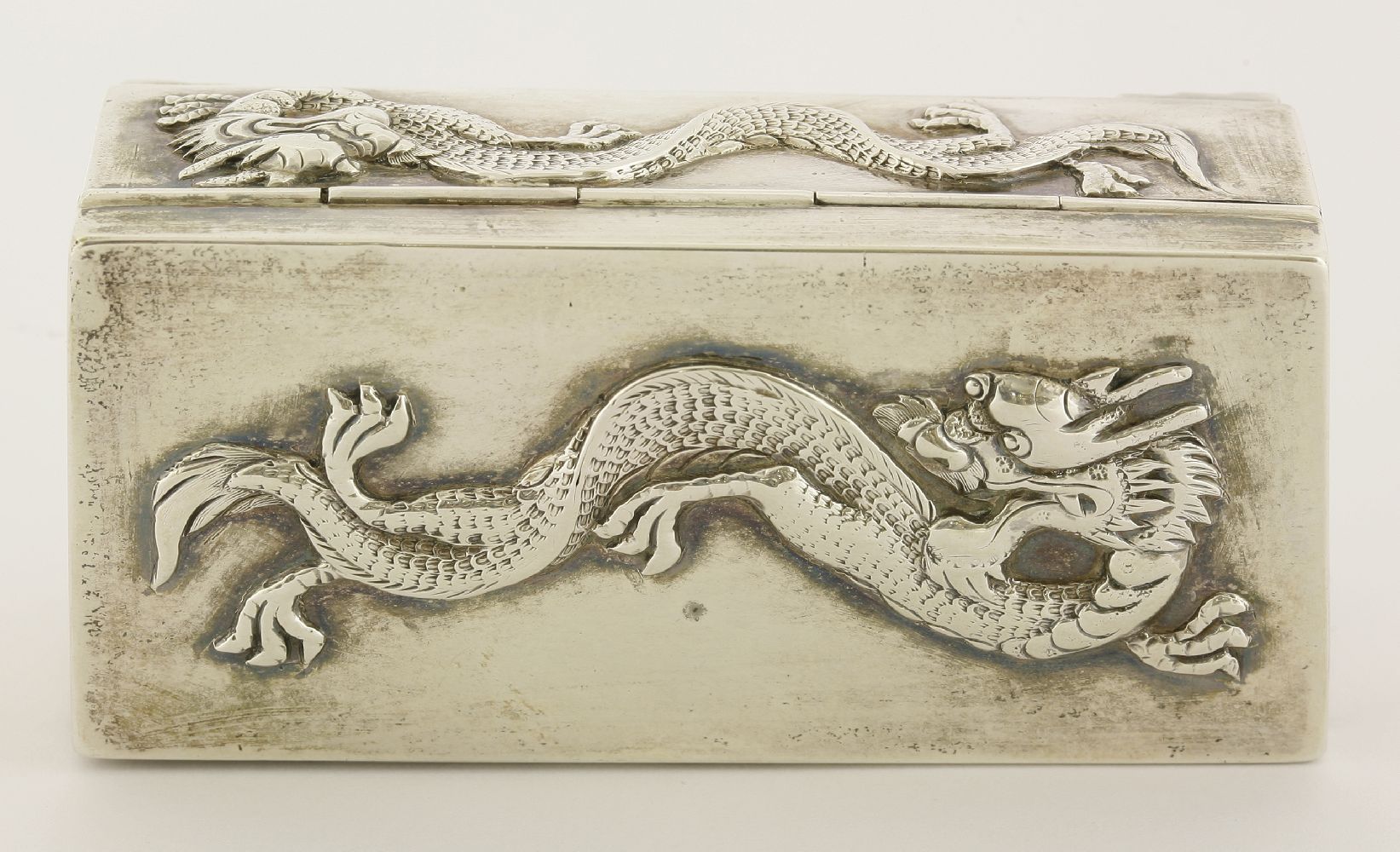 A silver hinged box and cover,early 20th century, by Wang Hing, of a rectangular form on four - Image 3 of 4