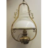 A reproduction brass hanging lamp, in the form of a Victorian oil lamp, 56cm high