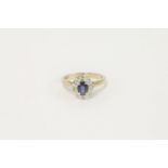 A 9ct gold sapphire and diamond oval cluster ring, size J leading edge J½2.55g