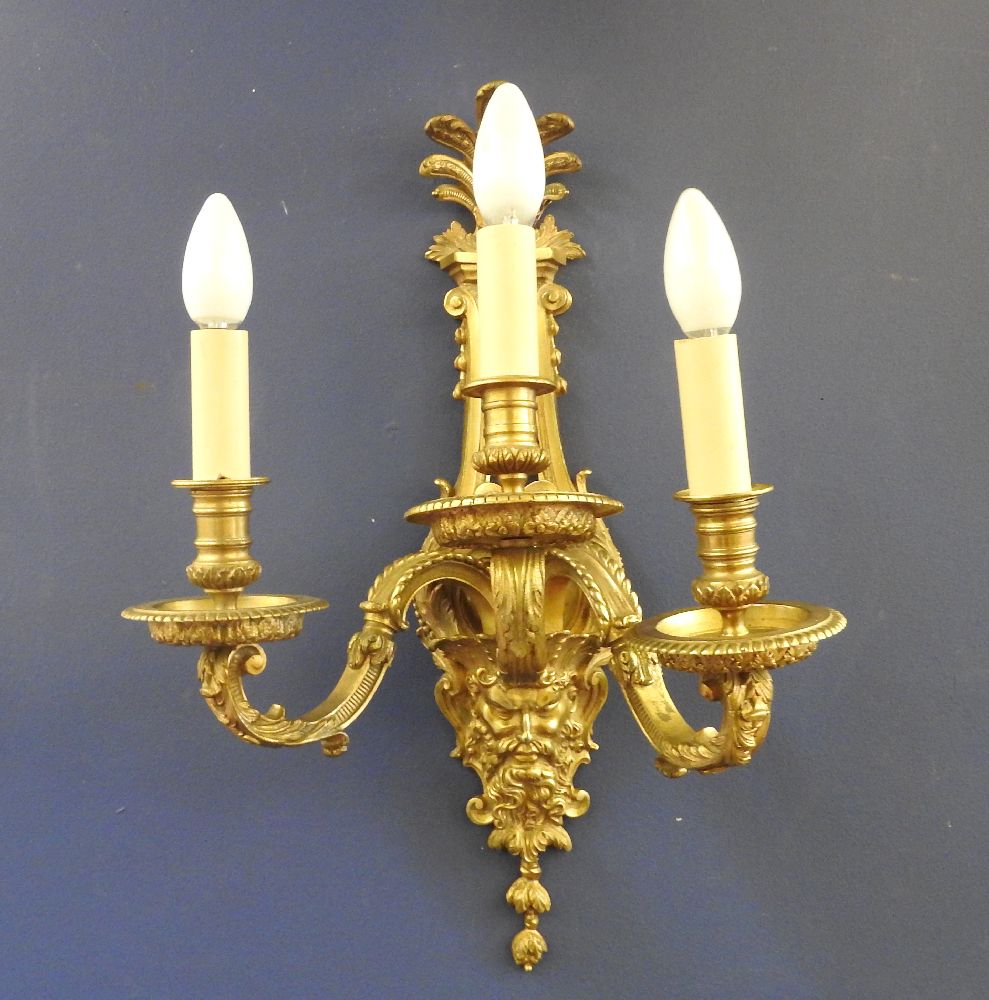 A 19th century ormolu three branch wall light, of classical form