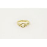A gentleman's 18ct gold single stone diamond ring, claw set to open shoulders, on a plain polished