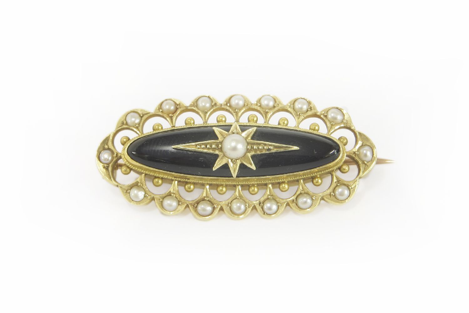 A Victorian gold and black onyx cabochon and seed pearl brooch, the centre seed pearl set to an