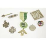 A collection of silver sporting medals, a silver gilt mosaic medal, two Scottish silver hardstone