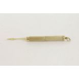 A 9ct gold tooth pick, by Deakin and Francis, with milled decoration5.82g