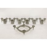 A set of medieval style suite of lights, comprising a four light candelabra, 66cm diameter, and a